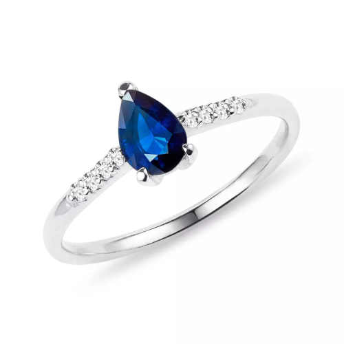 Zlatý dámský prsten s modrým safírem a diamanty
